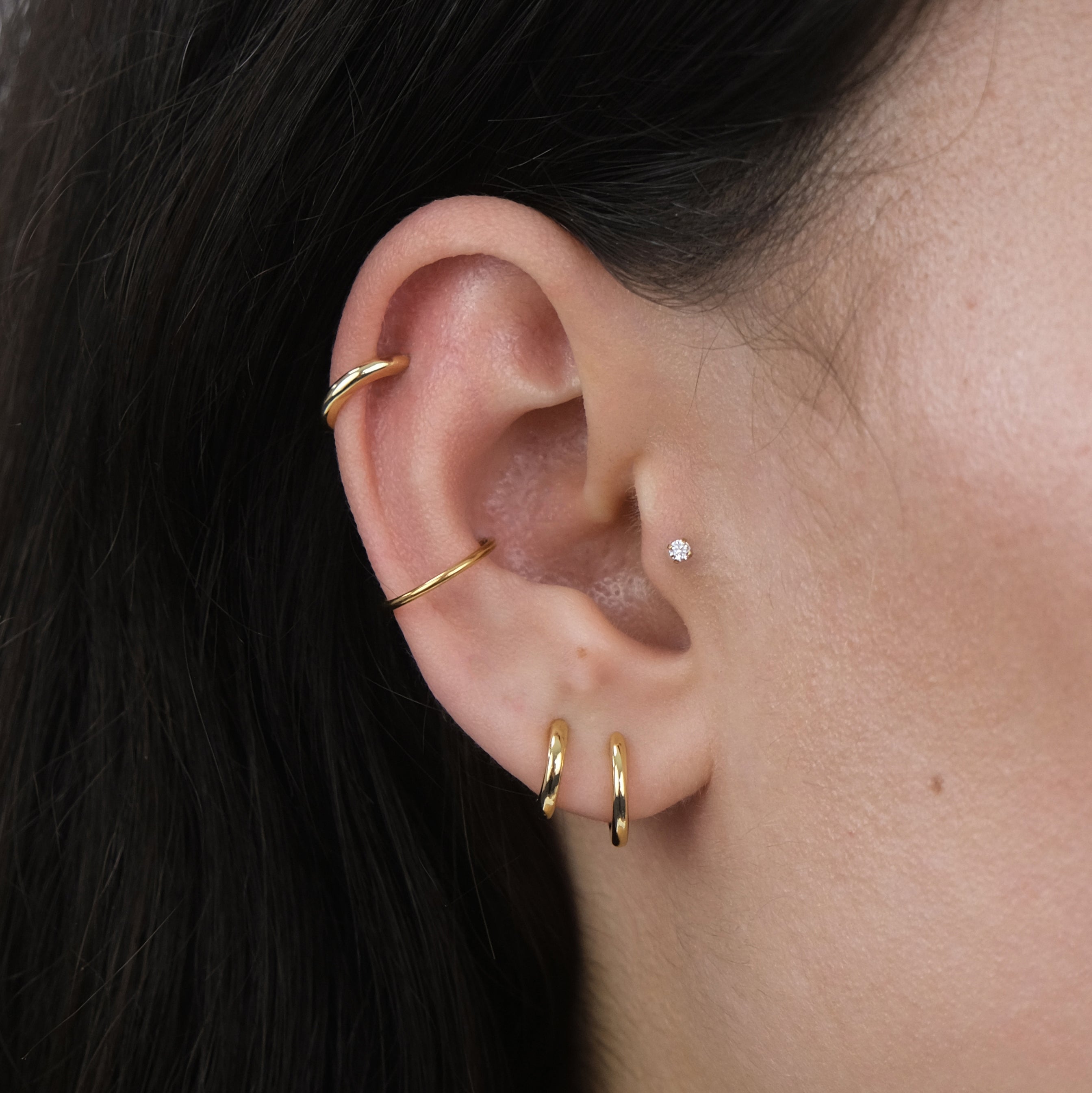 Classic plain huggie hoops in sterling silver with 6mm and 8mm inner diameter