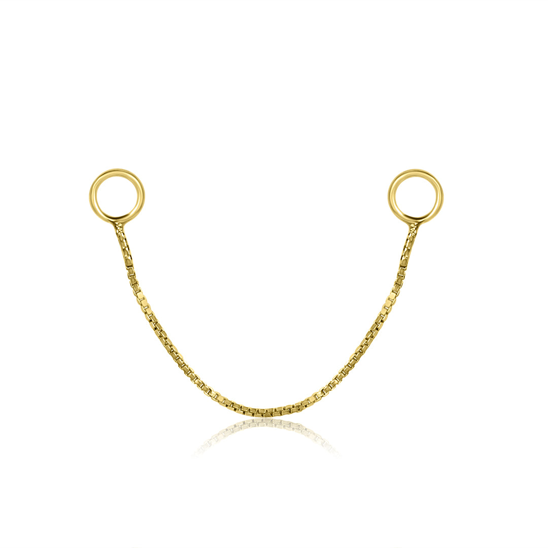 The Fine Box Chain Charm by Crystal Heaven London forms a U shape with circular loops at each end, set against a white background. Crafted from 925 Sterling Silver, this piece epitomises elegance and sophistication.