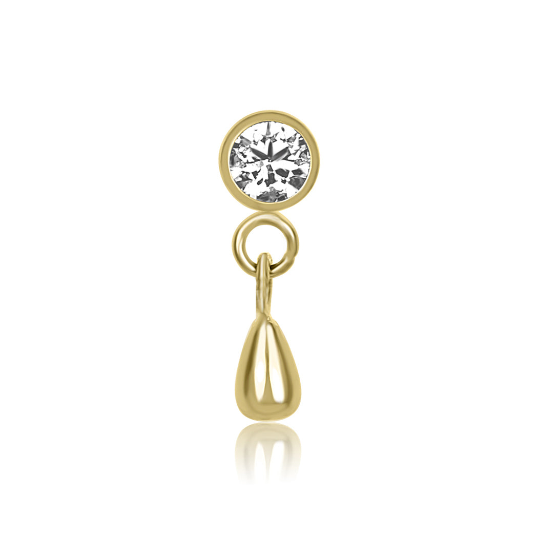 Gold earring with a round gemstone on a white background