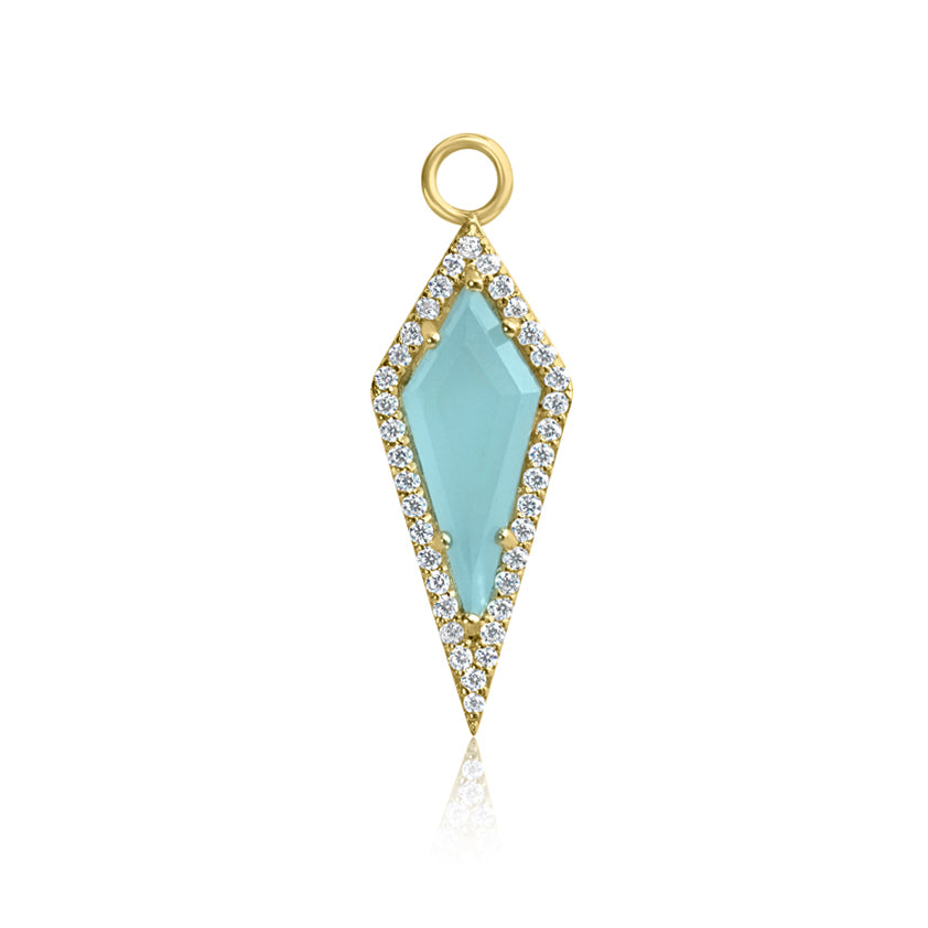 The AURA Aquamarine Pavé Kite Charm by Crystal Heaven London from the Nerida Collection is an exquisite gold diamond-shaped pendant with a central turquoise stone and clear gemstones, crafted in shimmering 925 Sterling Silver.
