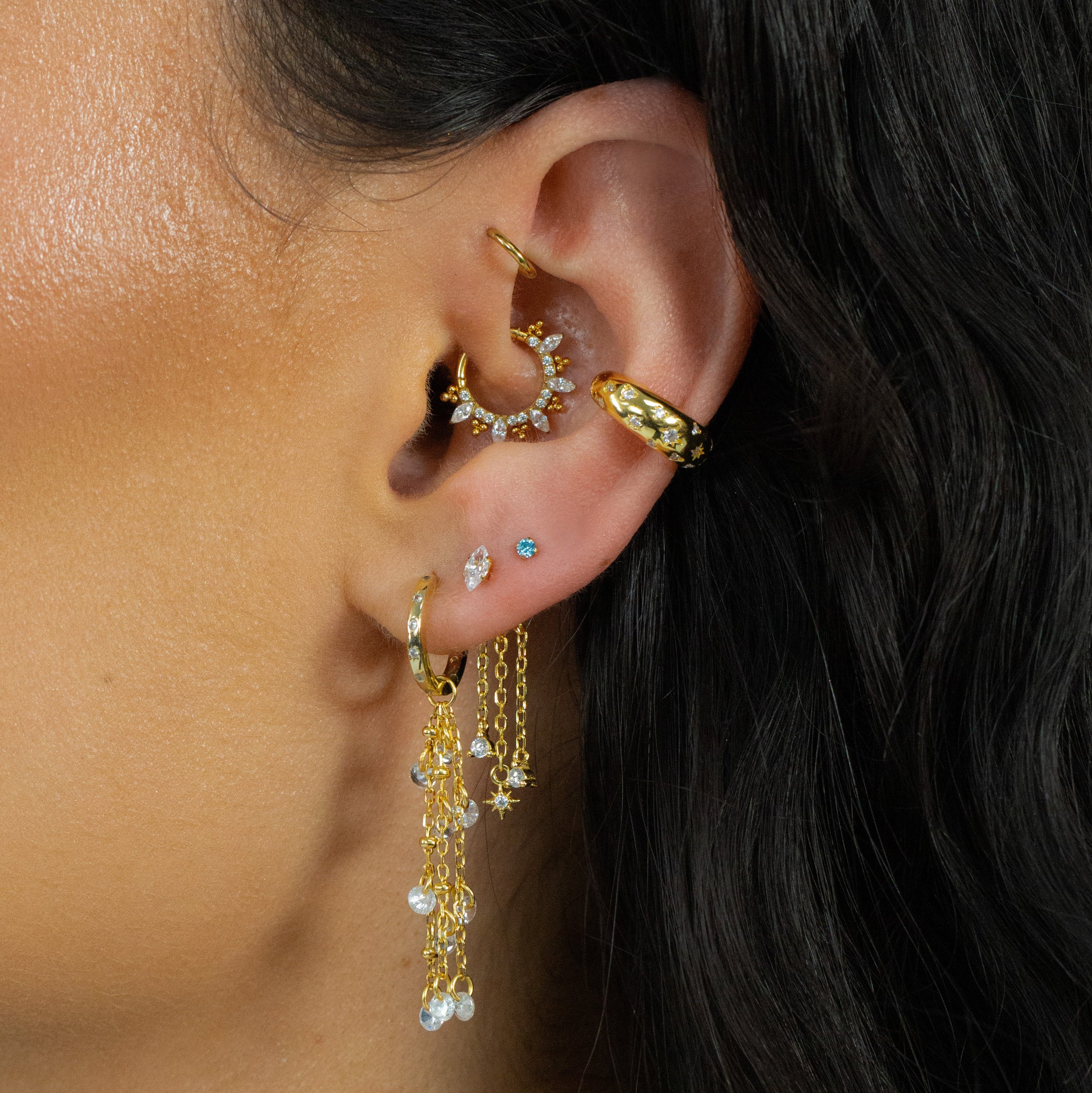 Close-up of an ear with Crystal Heaven London LILI Daith Hoop, adorned with marquise crystals.