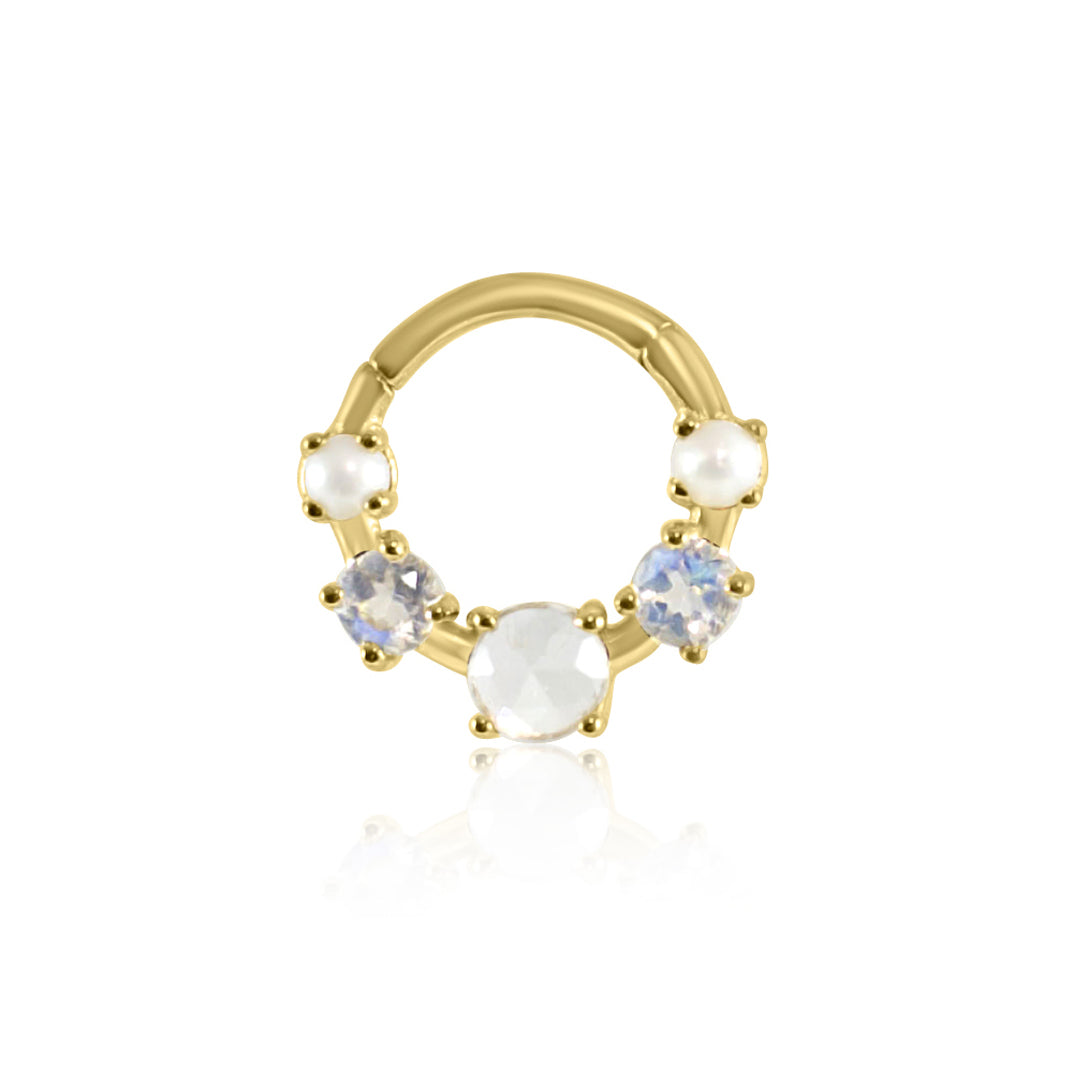 The CHLUXE Ophelia Gemstone Daith Hoop by Crystal Heaven London is crafted in 14K yellow gold, featuring five gemstones including pearls and clear stones, beautifully arranged along the lower half.