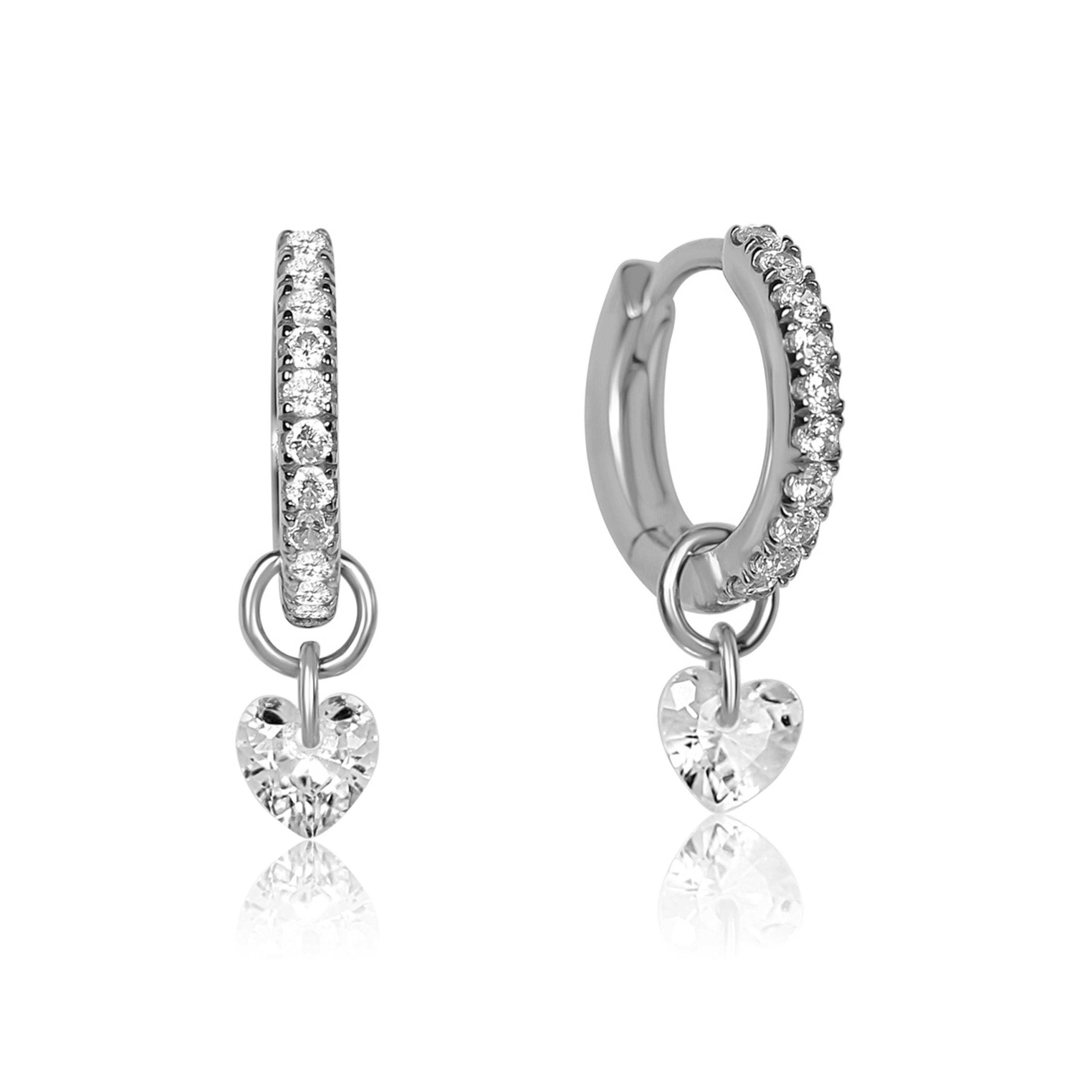 Silver hoop earrings with heart-shaped charms on a white background